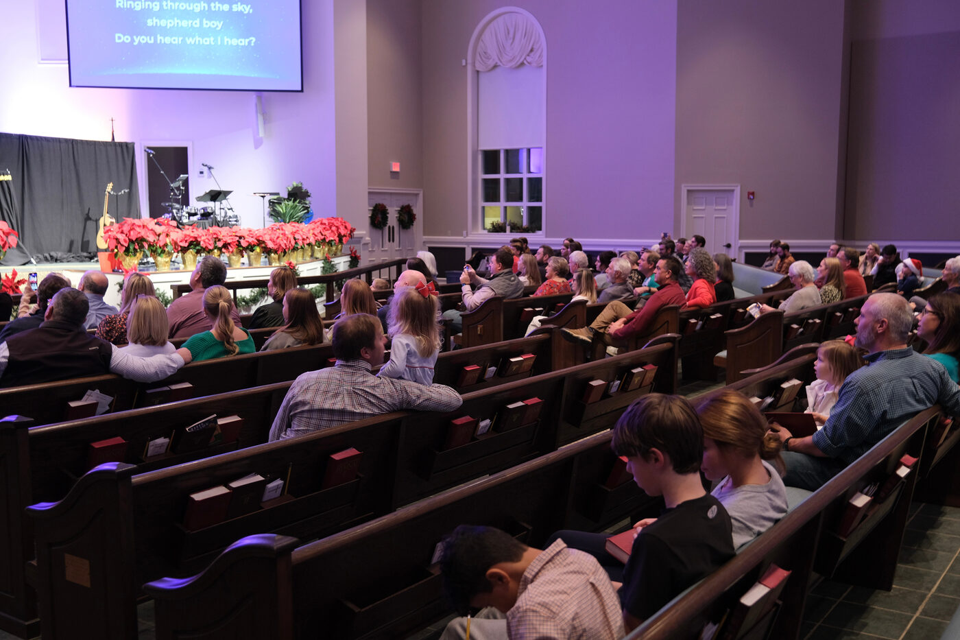 The congregation gathered for worship in the sanctuary