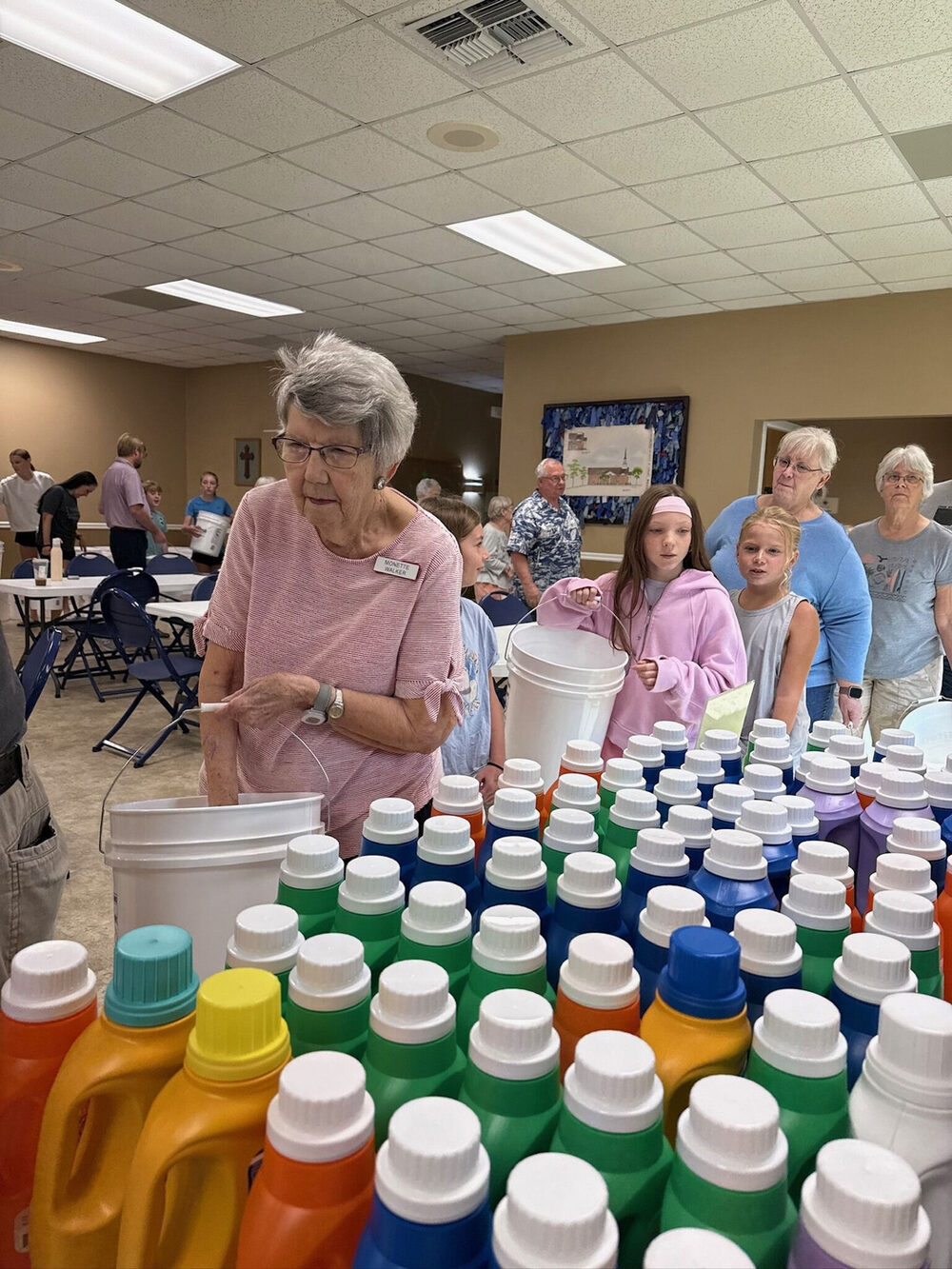 Members packing supplies for a mission drive
